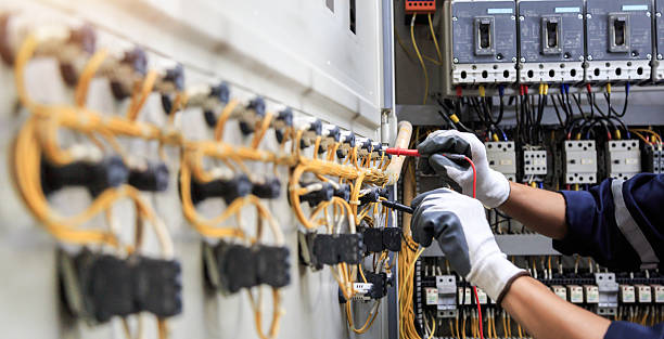 Professional Electrical Panel Upgrade technician working in Washita County County, OK